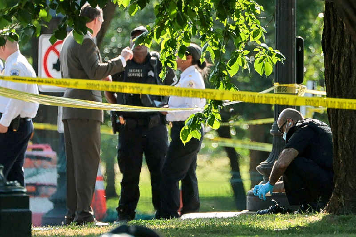 US Secret Service exchanged  gunfire with armed suspect